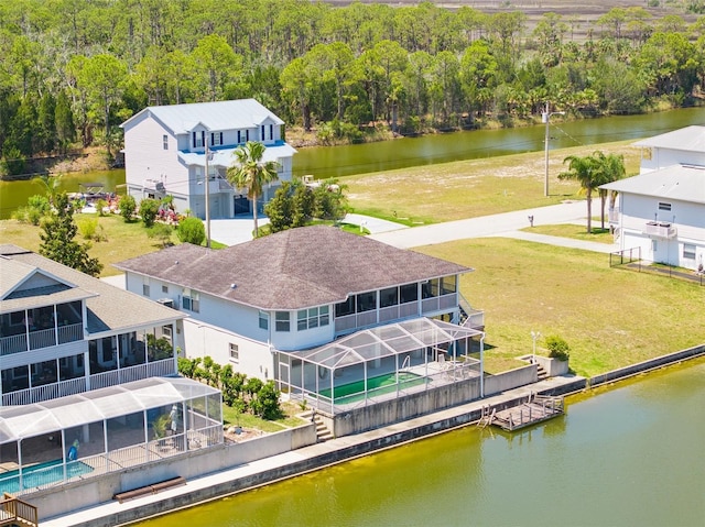 bird's eye view with a water view