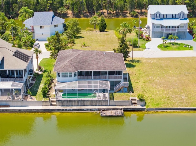 bird's eye view with a water view