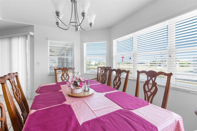 dining room with a notable chandelier