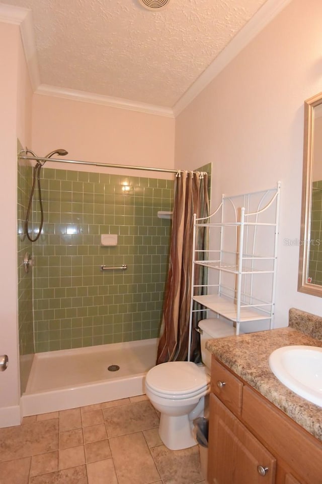 bathroom with ornamental molding, a shower with curtain, vanity, tile patterned flooring, and toilet