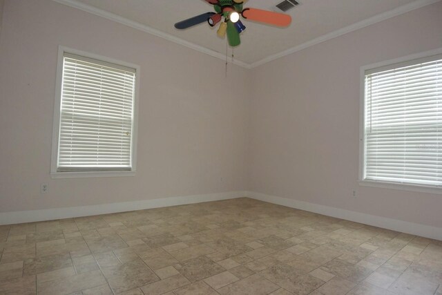 empty room featuring crown molding and ceiling fan