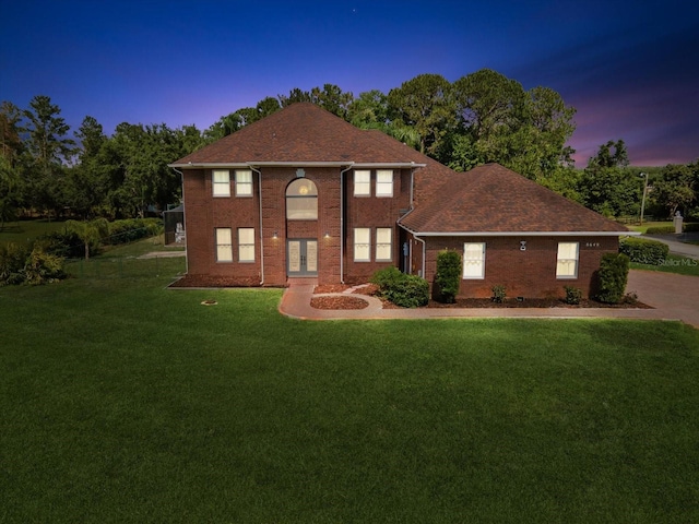 view of front facade with a yard