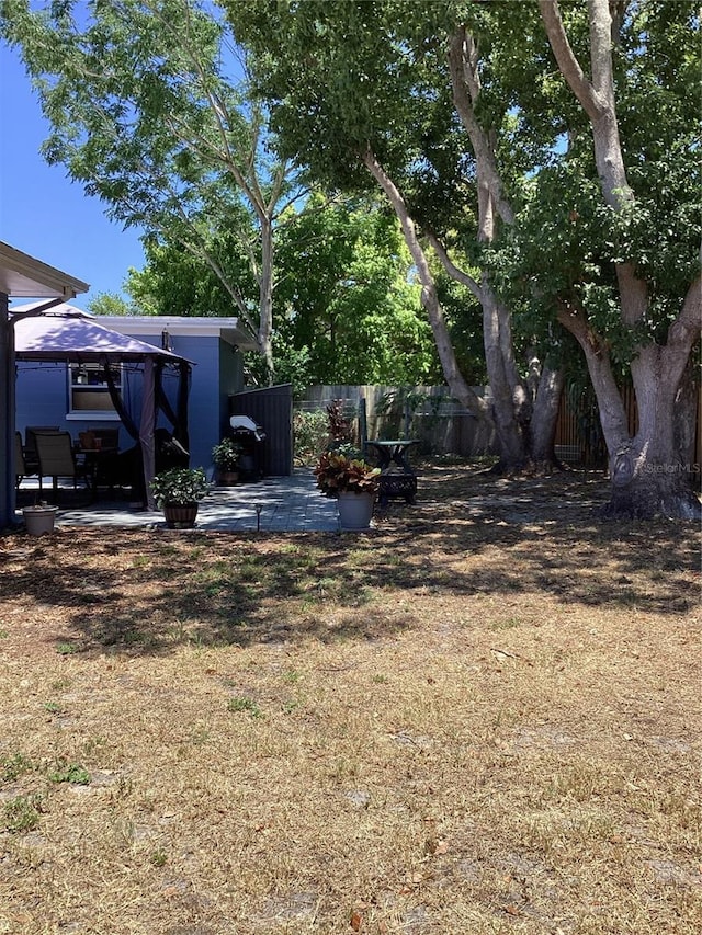 view of yard with a gazebo and a patio