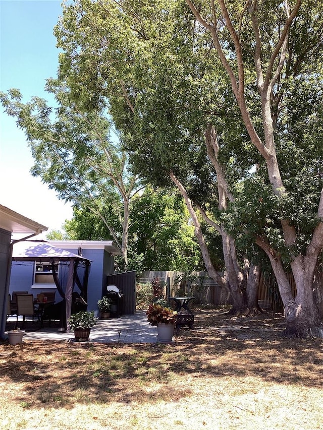 view of yard with a gazebo and a patio