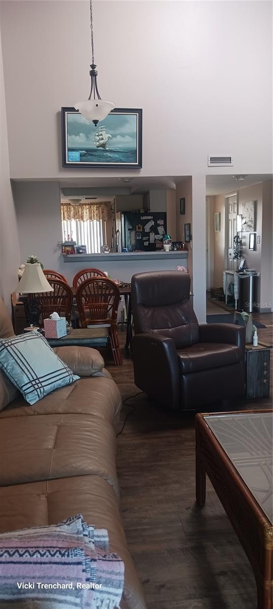 living room with wood-type flooring