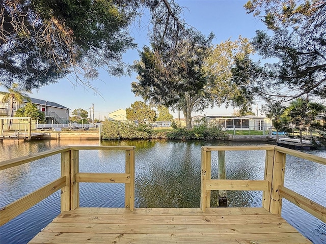 dock area featuring a water view