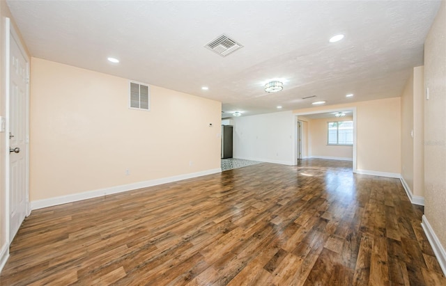 empty room featuring hardwood / wood-style floors