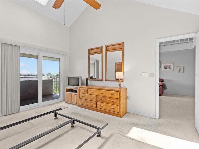 bedroom with ceiling fan, high vaulted ceiling, light colored carpet, visible vents, and access to outside