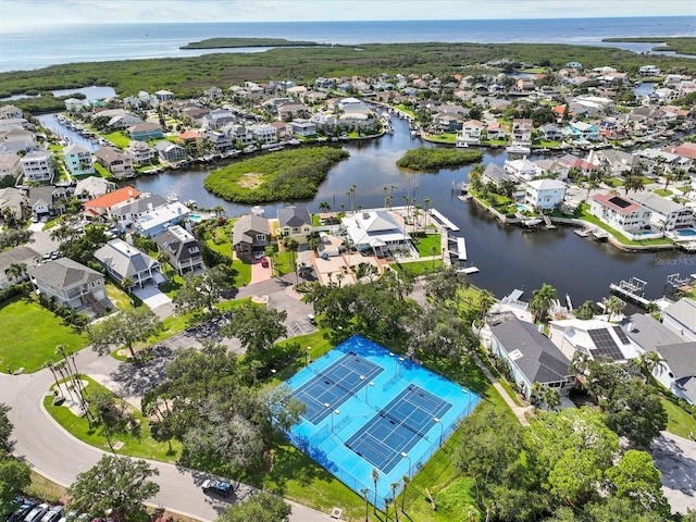 aerial view featuring a residential view and a water view