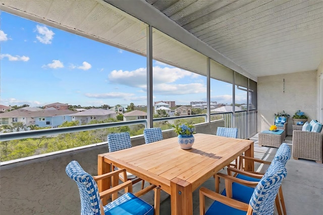 unfurnished sunroom with a residential view