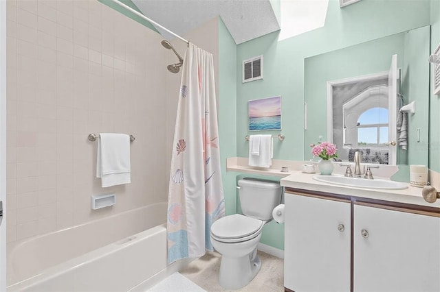 bathroom featuring visible vents, shower / tub combo with curtain, vanity, and toilet