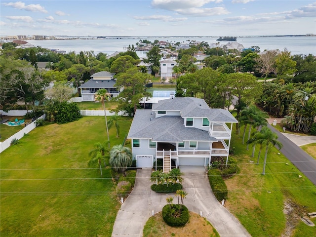 bird's eye view with a water view