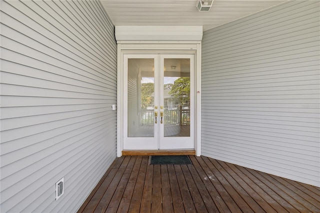 wooden deck with french doors