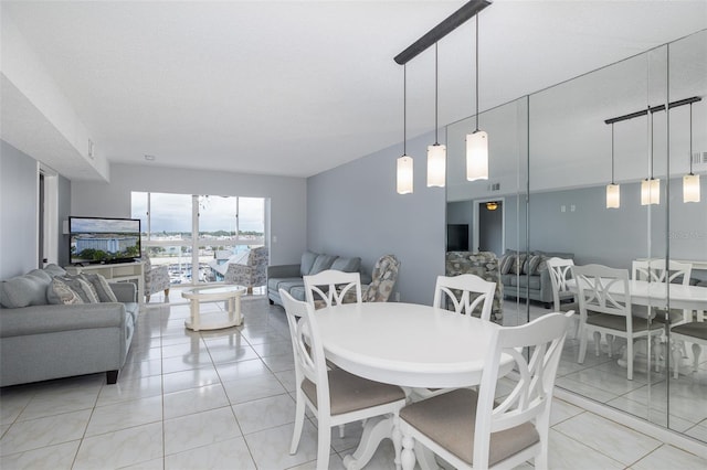 view of tiled dining space