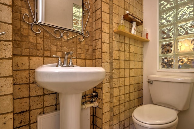 bathroom featuring toilet