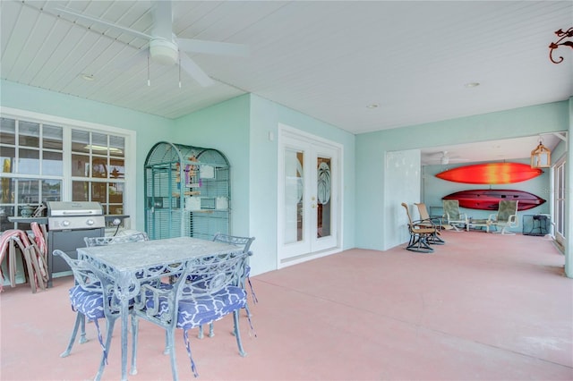 view of patio / terrace featuring ceiling fan, a grill, and french doors