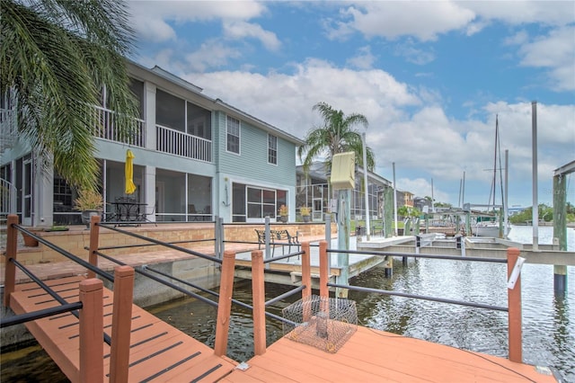 view of dock with a water view