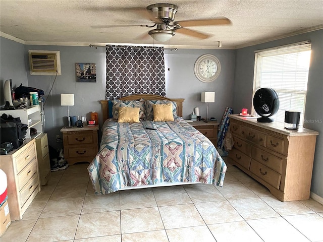 tiled bedroom featuring ceiling fan, a textured ceiling, and ornamental molding