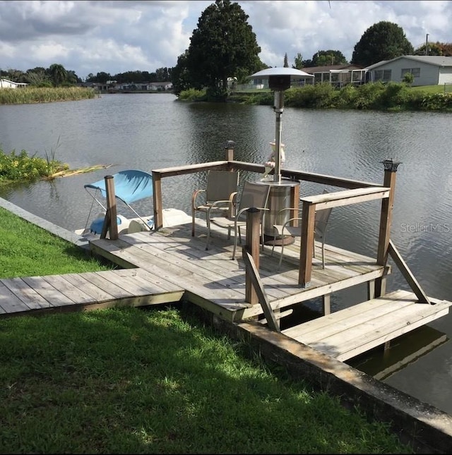 dock area featuring a water view