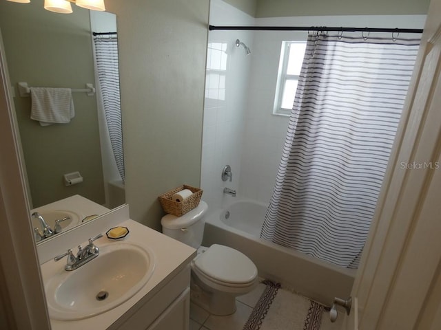 full bathroom with tile patterned flooring, vanity, shower / bath combo, and toilet