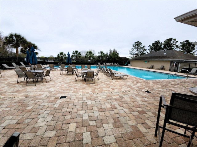 pool featuring a patio area