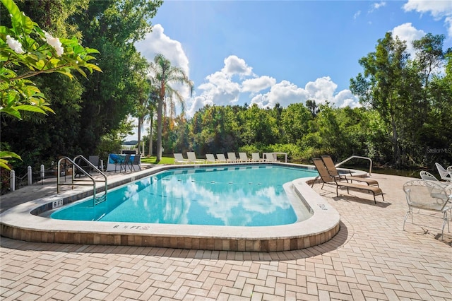 view of pool with a patio