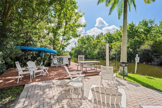 view of patio / terrace with a water view