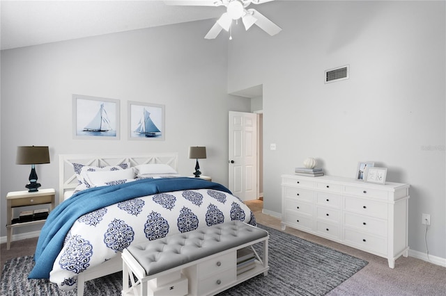 bedroom featuring ceiling fan, carpet floors, and high vaulted ceiling