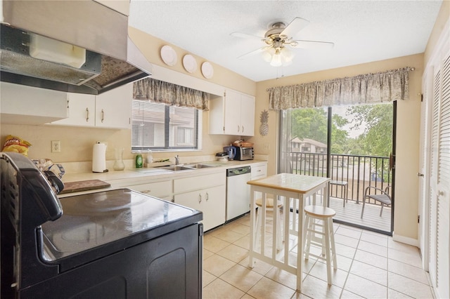 kitchen with ceiling fan, dishwashing machine, white cabinetry, and light tile floors