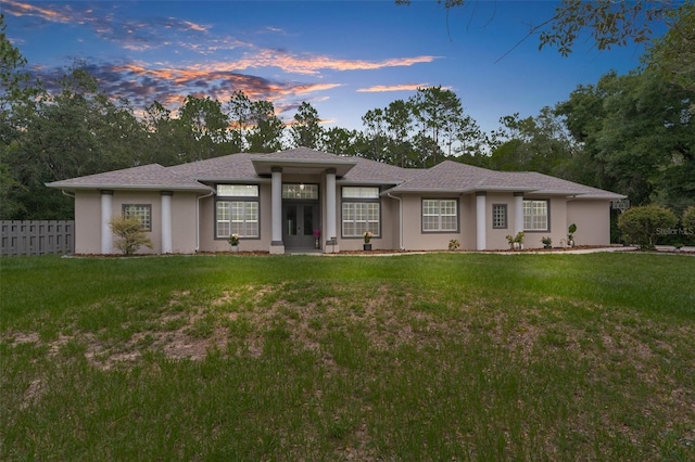 prairie-style house with a lawn