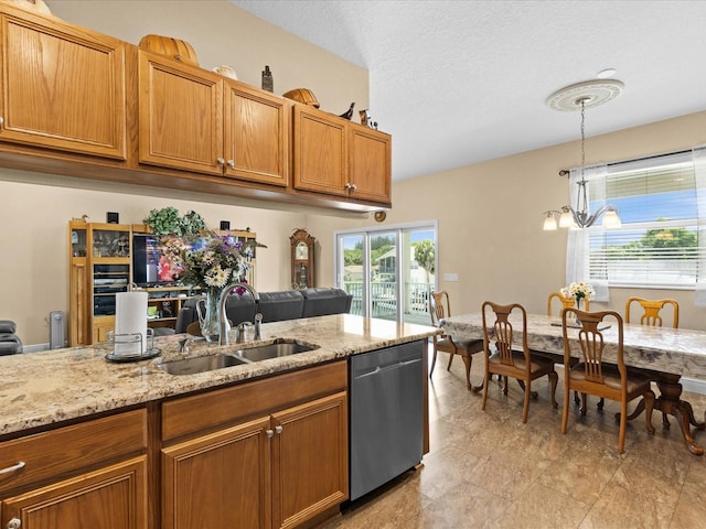 kitchen with dishwasher, sink, decorative light fixtures, light stone counters, and a chandelier