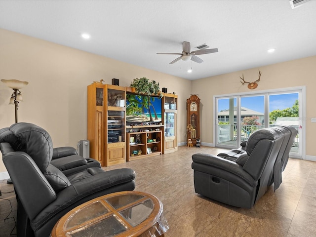 living room with ceiling fan