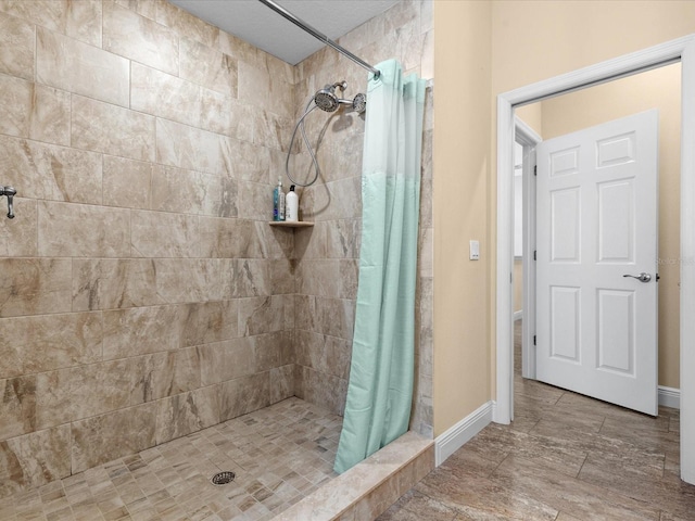 bathroom with a shower with shower curtain