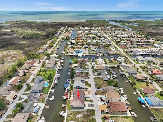 drone / aerial view featuring a water view