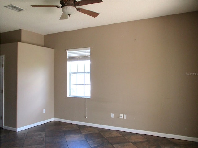 unfurnished room with ceiling fan