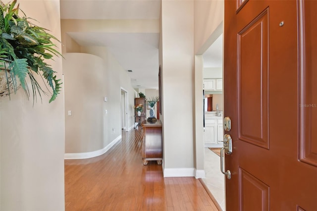 hall featuring light hardwood / wood-style flooring