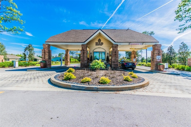 view of front of house featuring a carport