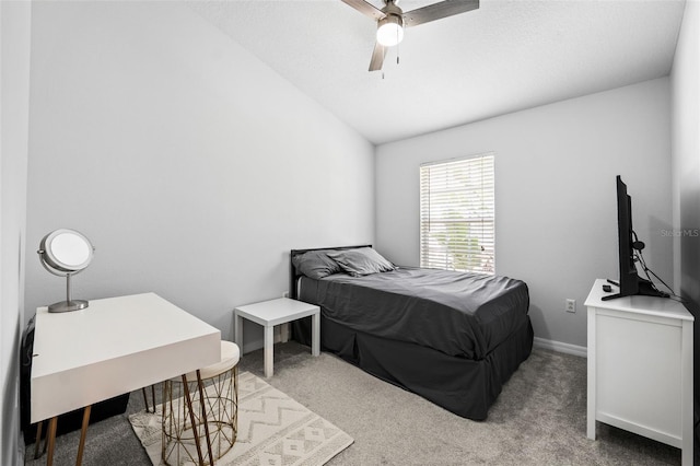 bedroom with light carpet, ceiling fan, and lofted ceiling