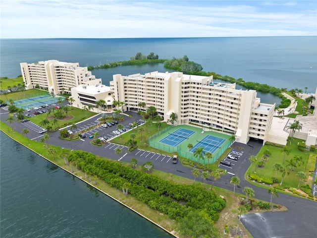 birds eye view of property featuring a water view