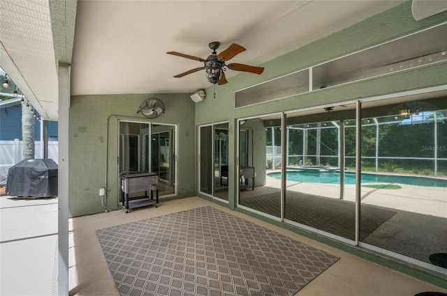 view of patio / terrace with ceiling fan and grilling area