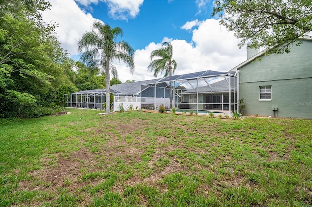 view of yard featuring a lanai