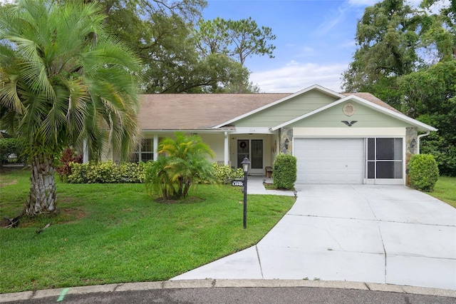 ranch-style house featuring a front yard and a garage