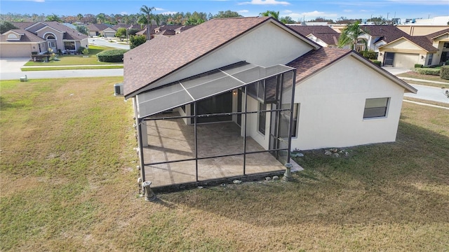 view of outdoor structure with a lawn