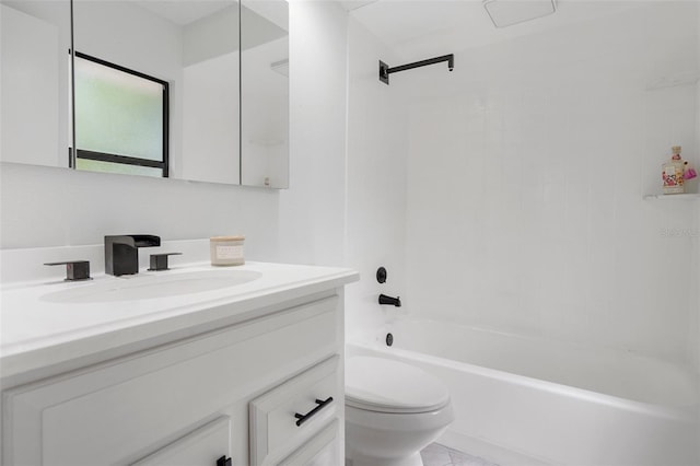 full bathroom with bathtub / shower combination, vanity, and toilet