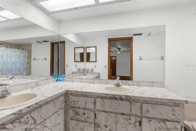 bathroom with vanity and ceiling fan