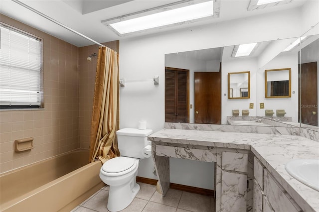 full bathroom featuring tile patterned flooring, vanity, shower / bath combination with curtain, and toilet