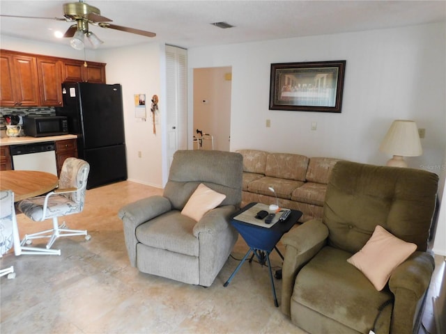 living room with ceiling fan