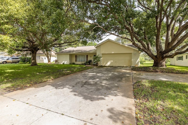 ranch-style house with a front yard and a garage