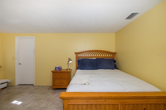 bedroom with a textured ceiling