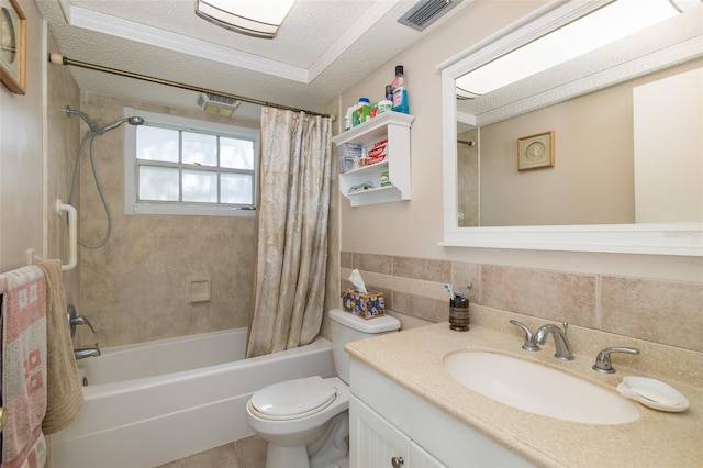 full bathroom with backsplash, a textured ceiling, shower / bath combo, toilet, and vanity